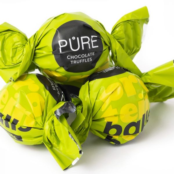 Tumšās šokolādes trifeles ar proteīna zemesriekstu krēma pildījumu 500g, PURE